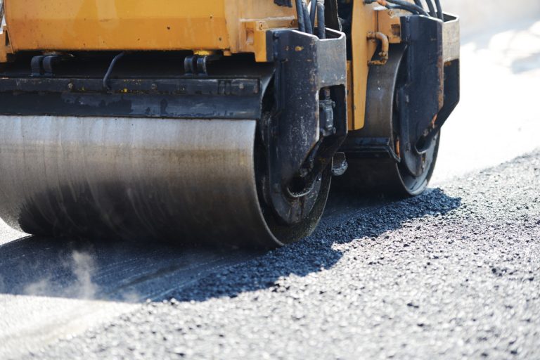 Hard work on asphalt construction